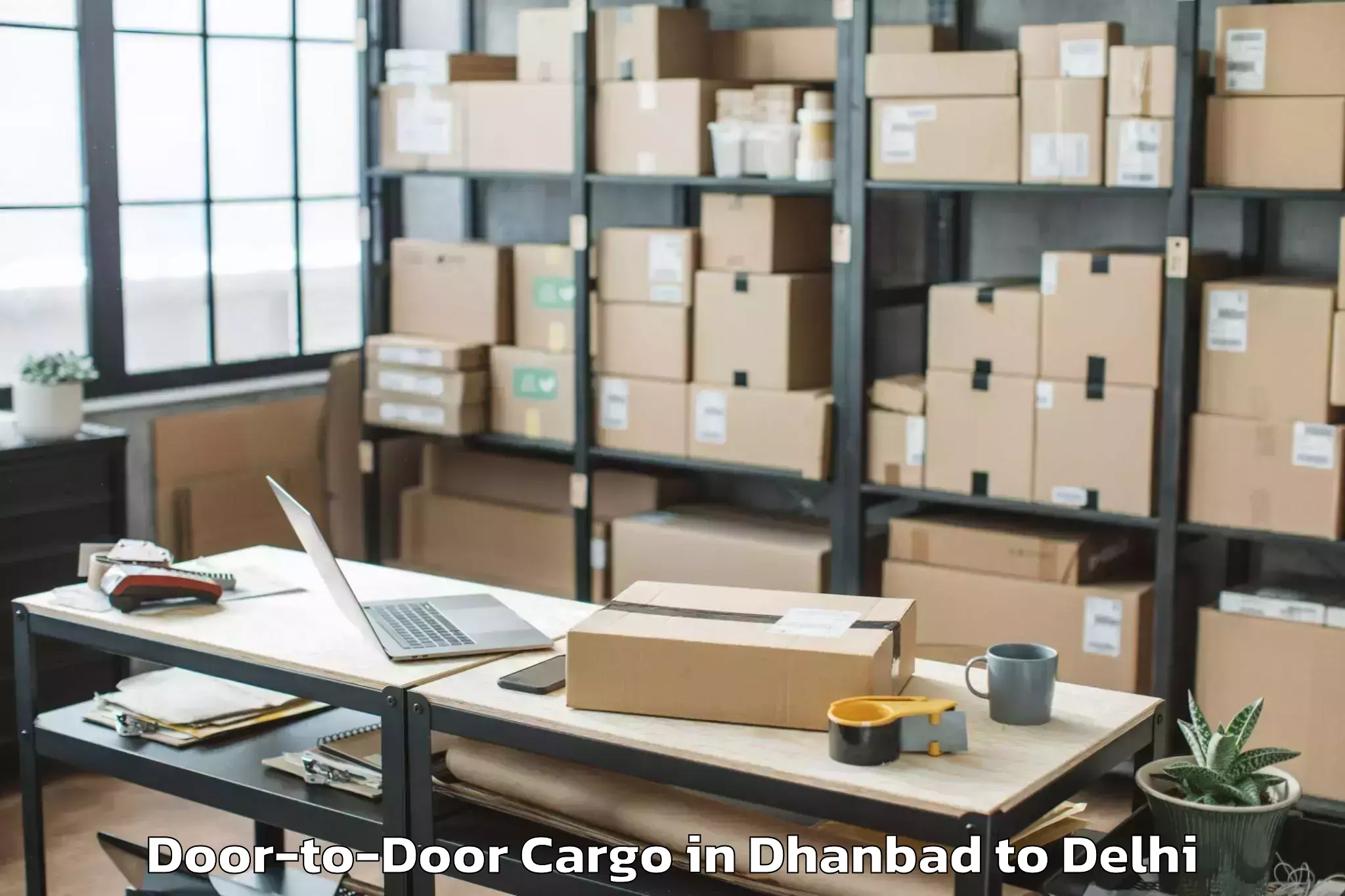 Easy Dhanbad to Unity One Mall Cbd Shahdara Door To Door Cargo Booking